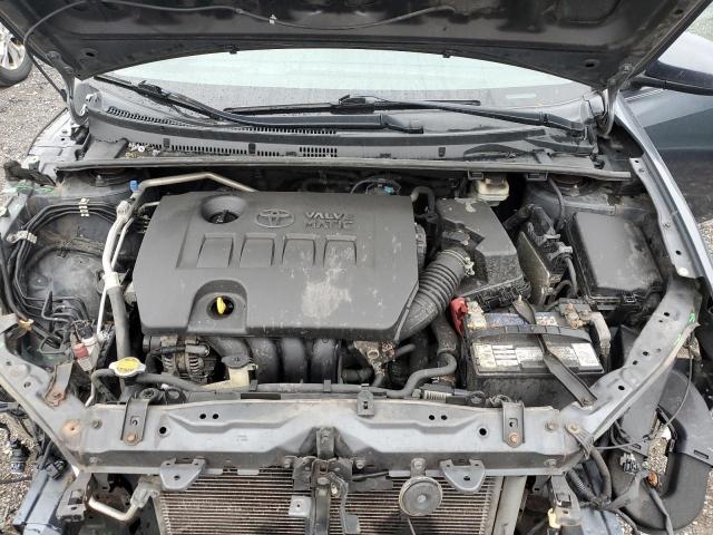Photo 11 from auction – 2014 TOYOTA COROLLA EC with VIN 2T1BPRHEXEC068571