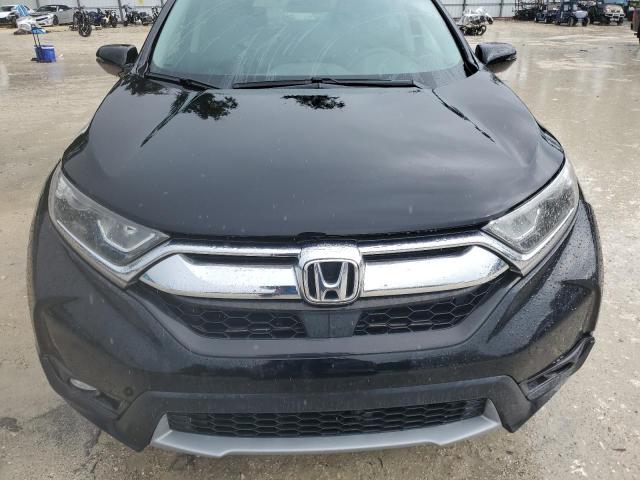 Photo 12 from auction – 2018 HONDA CR-V EX with VIN 7FARW1H50JE016007