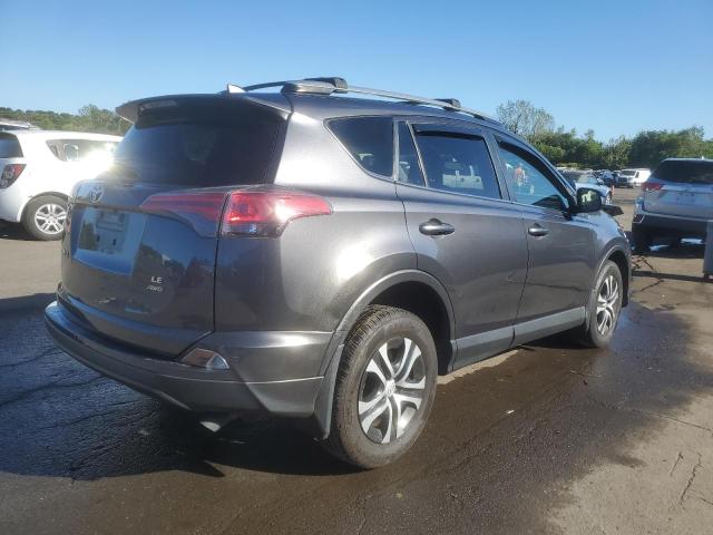 Photo 3 from auction – 2017 TOYOTA RAV4 LE with VIN JTMBFREV7HJ144568