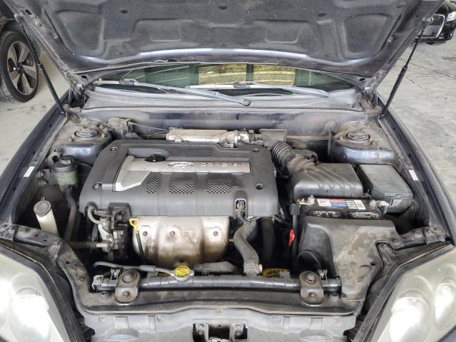 Photo 11 from auction – 2004 HYUNDAI TIBURON with VIN KMHHM65D04U107131