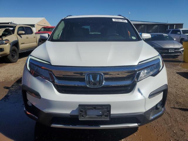 Photo 5 from auction – 2022 HONDA PILOT ELIT with VIN 5FNYF6H04NB066147