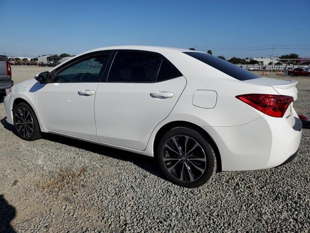 Photo 2 from auction – 2018 TOYOTA COROLLA L with VIN 5YFBURHE4JP818081