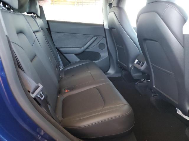 Photo 11 from auction – 2023 TESLA MODEL Y with VIN 7SAYGDEE2PA110277