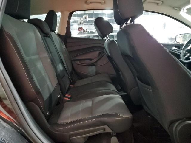 Photo 11 from auction – 2016 FORD ESCAPE SE with VIN 1FMCU9GX7GUA11424