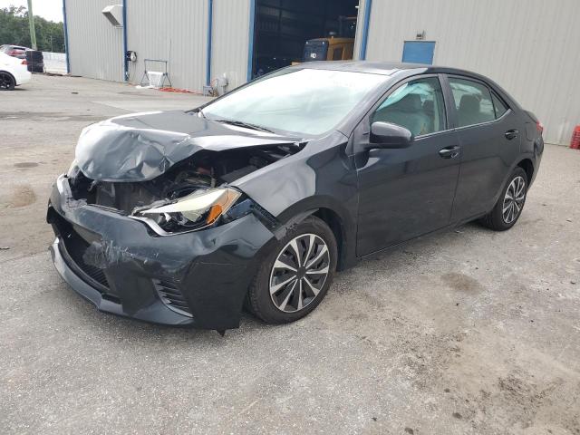 TOYOTA COROLLA L 2015 with VIN 5YFBURHE6FP284458 - Photo from auction