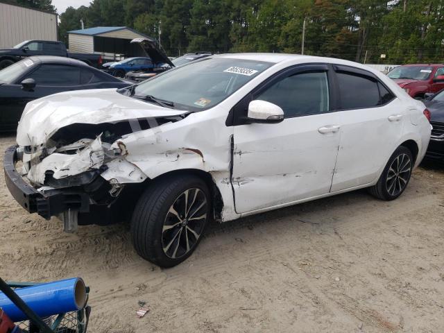 TOYOTA COROLLA L 2017 with VIN 5YFBURHE7HP667053 - Photo from auction
