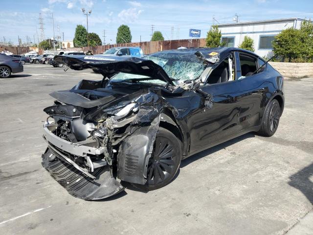 TESLA MODEL Y 2024 with VIN 7SAYGDEE6RA237634 - Photo from auction