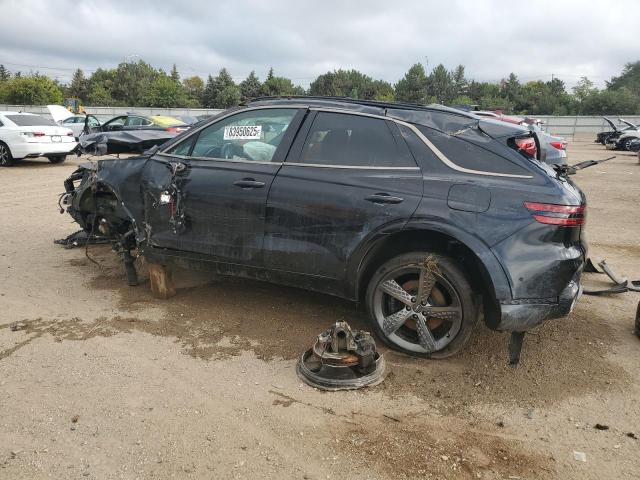Photo 2 from auction – 2023 GENESIS GV70 BASE with VIN KMUMADTB7PU117738
