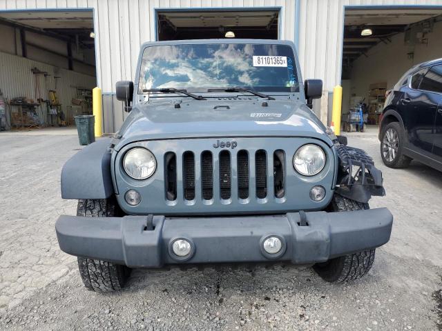 Photo 5 from auction – 2014 JEEP WRANGLER U with VIN 1C4BJWFG0EL127690