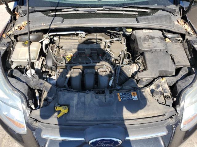 Photo 11 from auction – 2014 FORD FOCUS SE with VIN 1FADP3F21EL413127