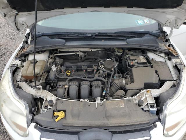 Photo 12 from auction – 2014 FORD FOCUS with VIN 1FADP3F2XEL226839