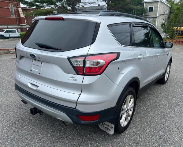 Photo 4 from auction – 2018 FORD ESCAPE SE with VIN 1FMCU9GD4JUB01319