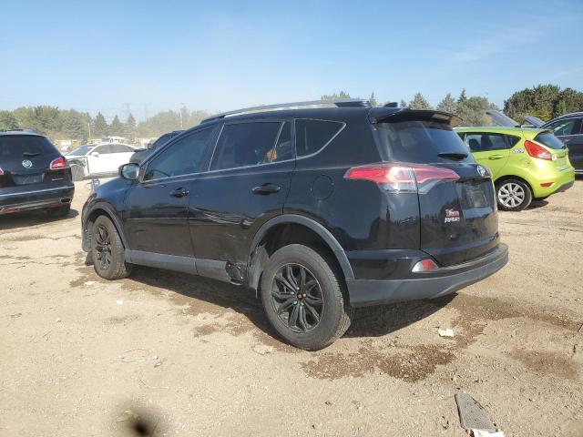 Photo 2 from auction – 2017 TOYOTA RAV4 LE with VIN 2T3BFREV4HW571627