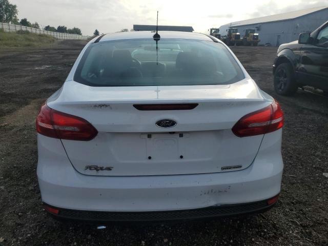 Photo 6 from auction – 2015 FORD FOCUS S with VIN 1FADP3E21FL305626