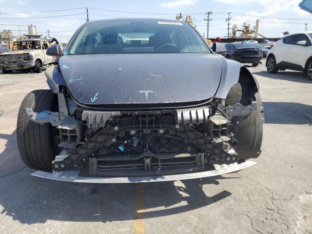 Photo 5 from auction – 2021 TESLA MODEL 3 with VIN 5YJ3E1ECXMF075836