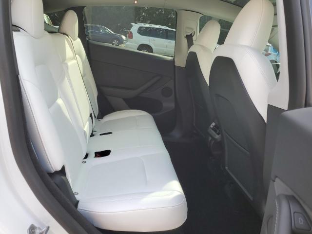 Photo 11 from auction – 2023 TESLA MODEL Y with VIN 7SAYGDEF1PF705018