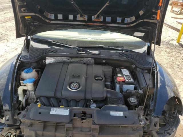 Photo 11 from auction – 2013 VOLKSWAGEN BEETLE with VIN 3VW5P7AT9DM832472