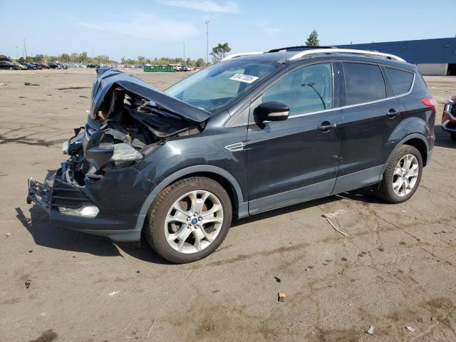 FORD ESCAPE TIT 2014 with VIN 1FMCU0JX3EUA03595 - Photo from auction