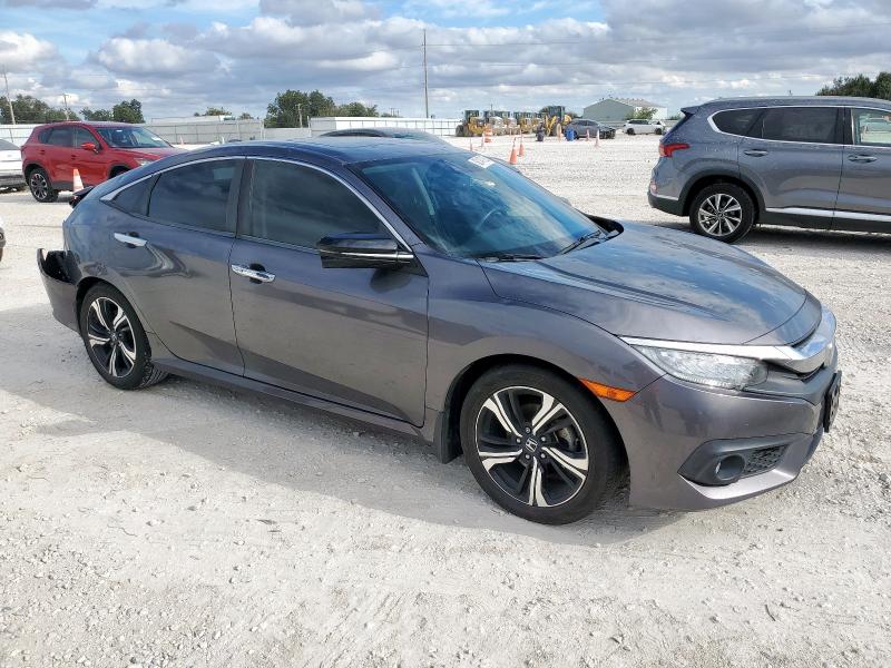 Photo 4 from auction – 2018 HONDA CIVIC TOUR with VIN JHMFC1F93JX024698