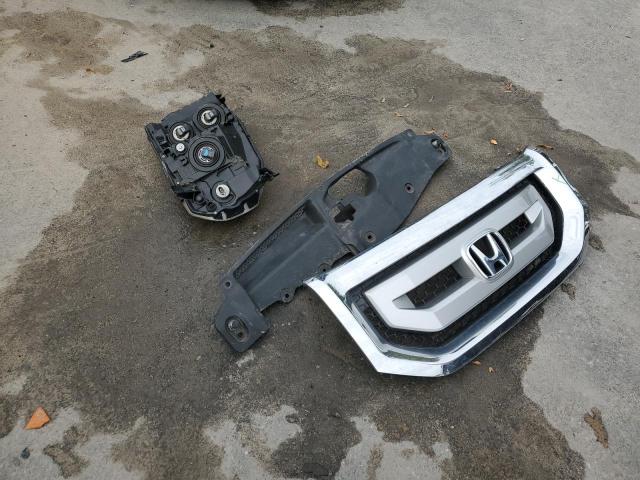 Photo 13 from auction – 2011 HONDA PILOT LX with VIN 5FNYF4H2XBB025541