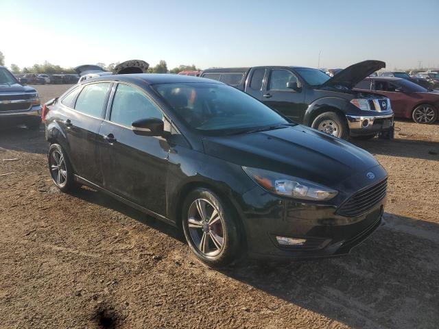 Photo 4 from auction – 2017 FORD FOCUS SE with VIN 1FADP3FE0HL284361