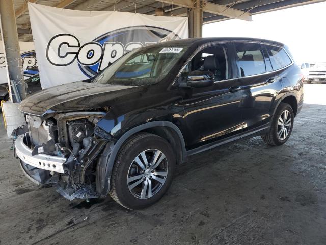 HONDA PILOT EXL 2017 with VIN 5FNYF5H52HB017345 - Photo from auction