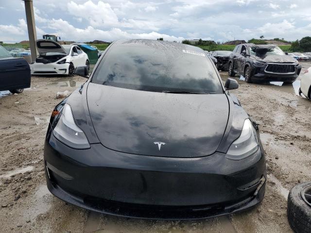 Photo 5 from auction – 2023 TESLA MODEL 3 with VIN 5YJ3E1EA5PF556158