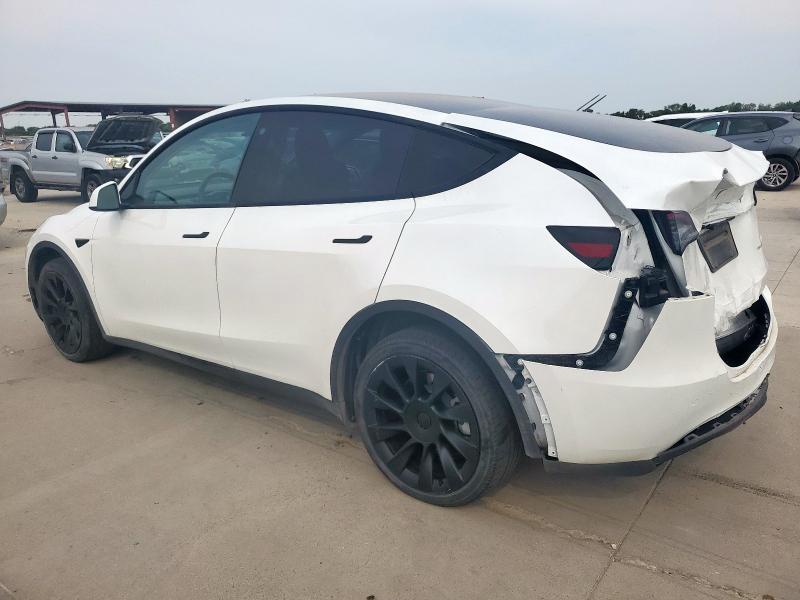 Photo 2 from auction – 2023 TESLA MODEL Y with VIN 7SAYGDEE6PA098649