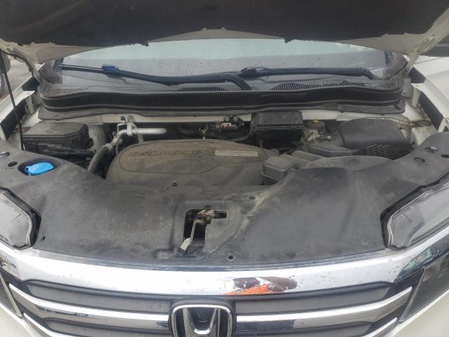 Photo 12 from auction – 2017 HONDA PILOT LX with VIN 5FNYF5H12HB023630