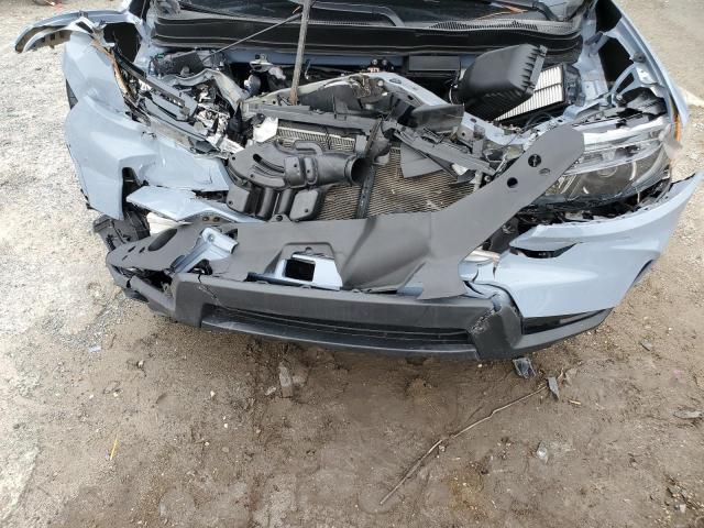 Photo 12 from auction – 2022 HONDA PASSPORT E with VIN 5FNYF7H55NB007030