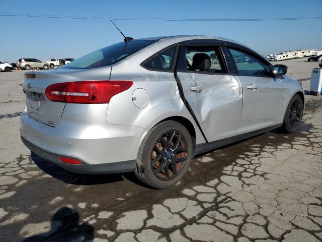 Photo 3 from auction – 2016 FORD FOCUS SE with VIN 1FADP3F21GL332292