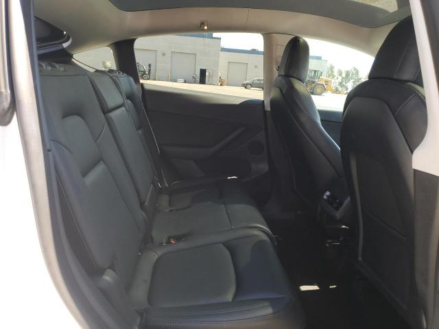 Photo 11 from auction – 2022 TESLA MODEL Y with VIN 7SAYGAEE1NF490744