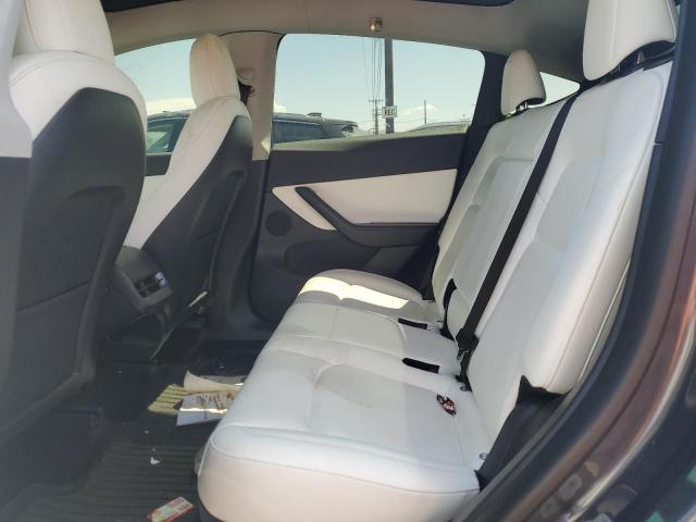 Photo 11 from auction – 2022 TESLA MODEL Y with VIN 7SAYGDEFXNF337046