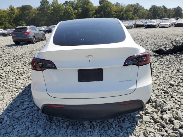 Photo 6 from auction – 2023 TESLA MODEL Y with VIN 7SAYGDEE3PF628949