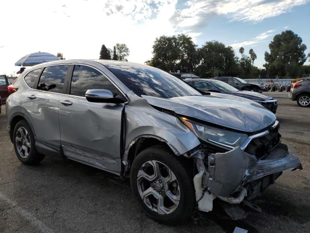 Photo 4 from auction – 2018 HONDA CR-V with VIN 5J6RW1H59JA010723