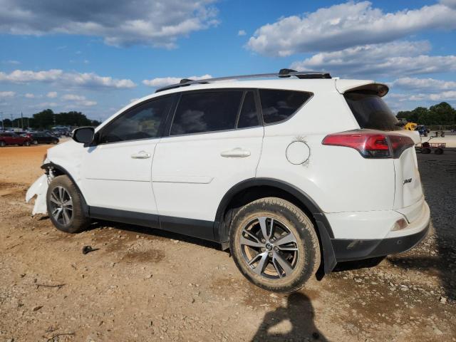Photo 2 from auction – 2017 TOYOTA RAV4 XLE with VIN JTMWFREV4HD102486