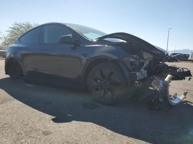 Photo 4 from auction – 2025 TESLA MODEL Y with VIN 7SAYGDED6SF313269