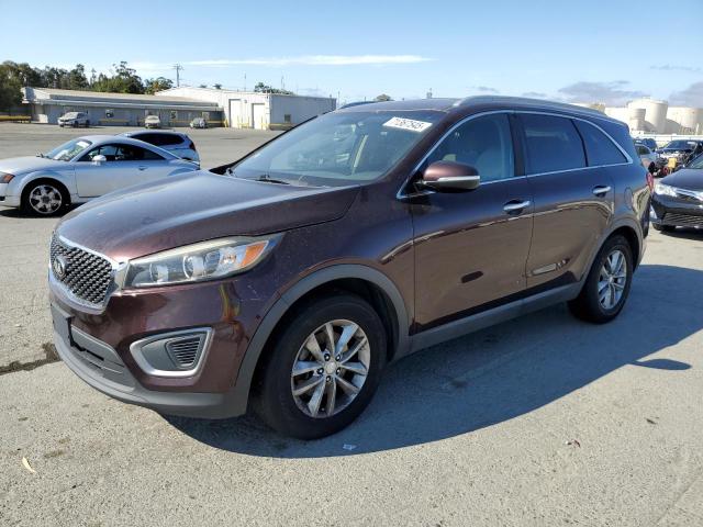 KIA SORENTO LX 2016 with VIN 5XYPG4A57GG010072 - Photo from auction