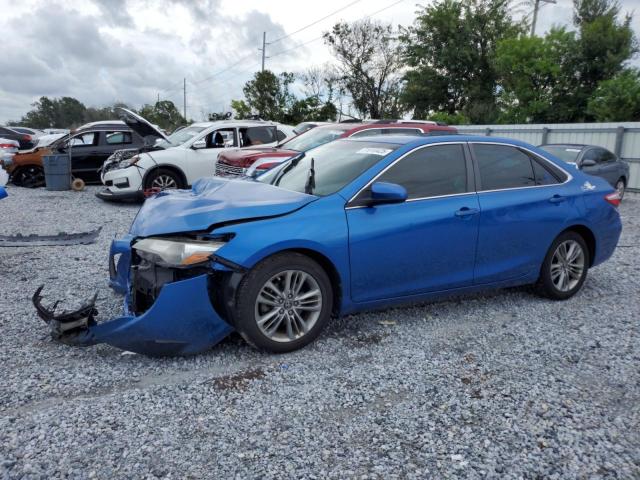 TOYOTA CAMRY LE 2017 with VIN 4T1BF1FKXHU806126 - Photo from auction