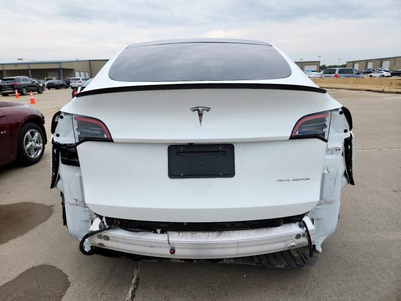 Photo 6 from auction – 2023 TESLA MODEL Y with VIN 7SAYGAEE9PF625147