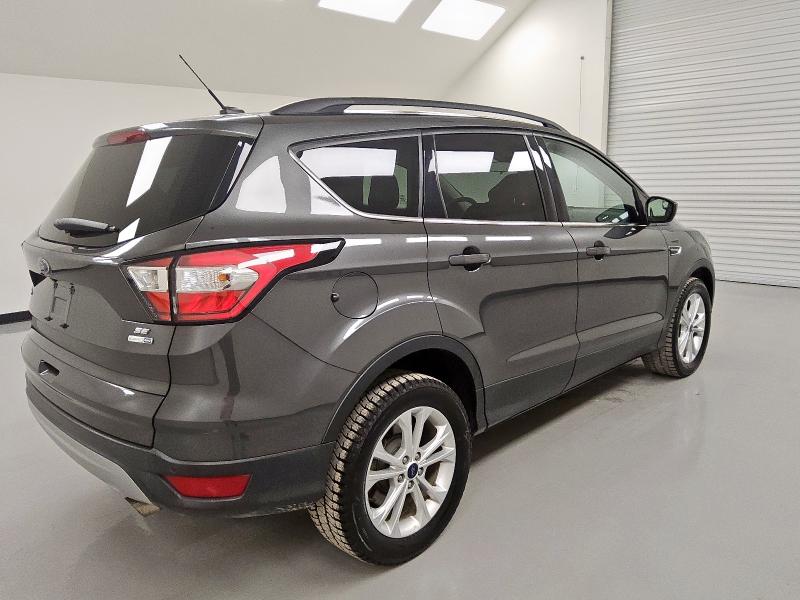 Photo 3 from auction – 2018 FORD ESCAPE SE with VIN 1FMCU9GD4JUB16192