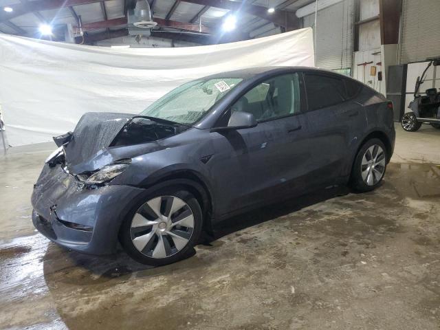 TESLA MODEL Y 2023 with VIN 7SAYGDEE8PA140884 - Photo from auction