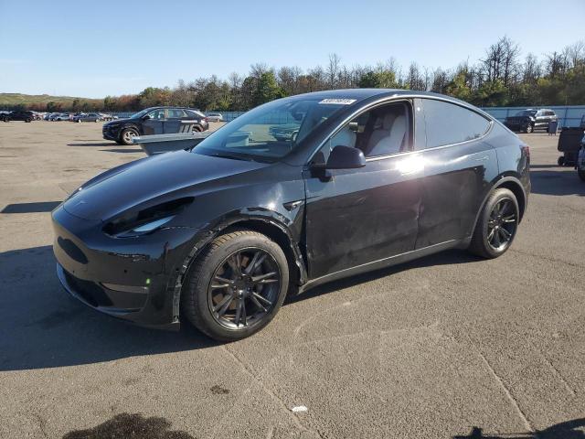 TESLA MODEL Y 2022 with VIN 7SAYGAEE0NF520218 - Photo from auction