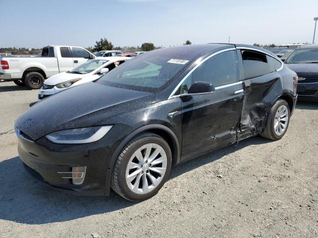 TESLA MODEL X 2016 with VIN 5YJXCAE2XGF029264 - Photo from auction