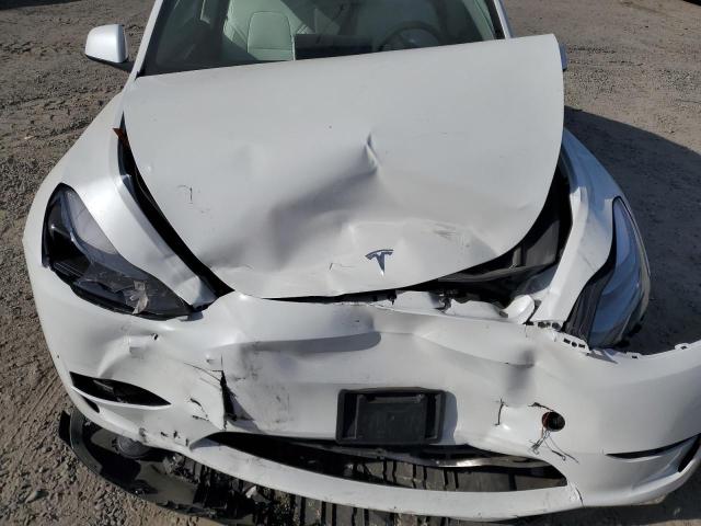 Photo 11 from auction – 2025 TESLA MODEL Y with VIN 7SAYGDEE9SF276162