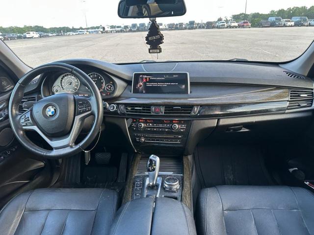 Photo 9 from auction – 2015 BMW X5 XDRIVE3 with VIN 5UXKR0C50F0P12764