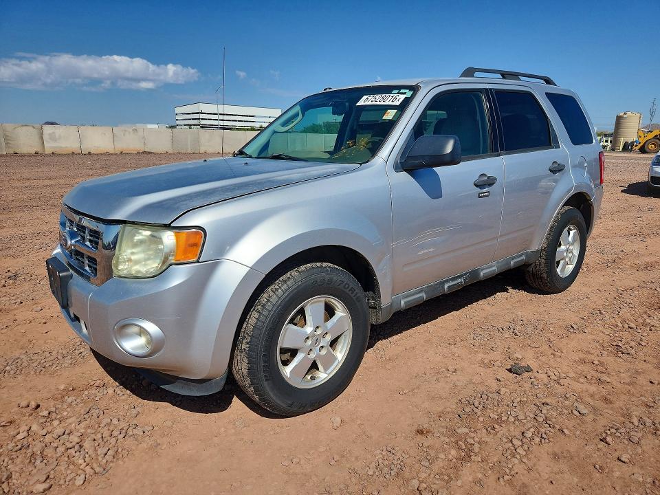 FORD ESCAPE 2010 with VIN 1FMCU0D71AKD21328 - Photo from auction