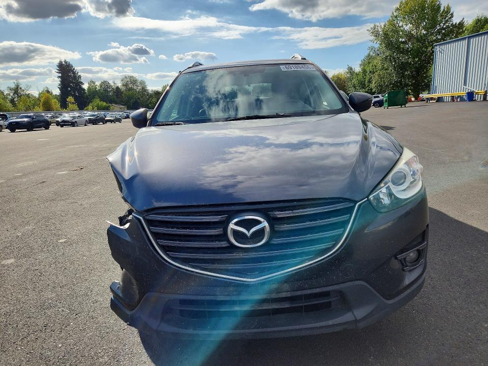 Photo 5 from auction – 2016 MAZDA CX-5 with VIN JM3KE4DY7G0903345