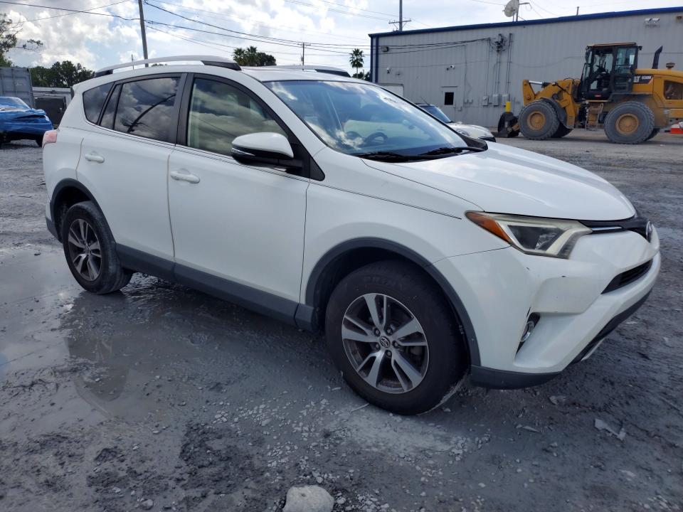 Photo 4 from auction – 2016 TOYOTA RAV4 with VIN JTMWFREVXGD084591