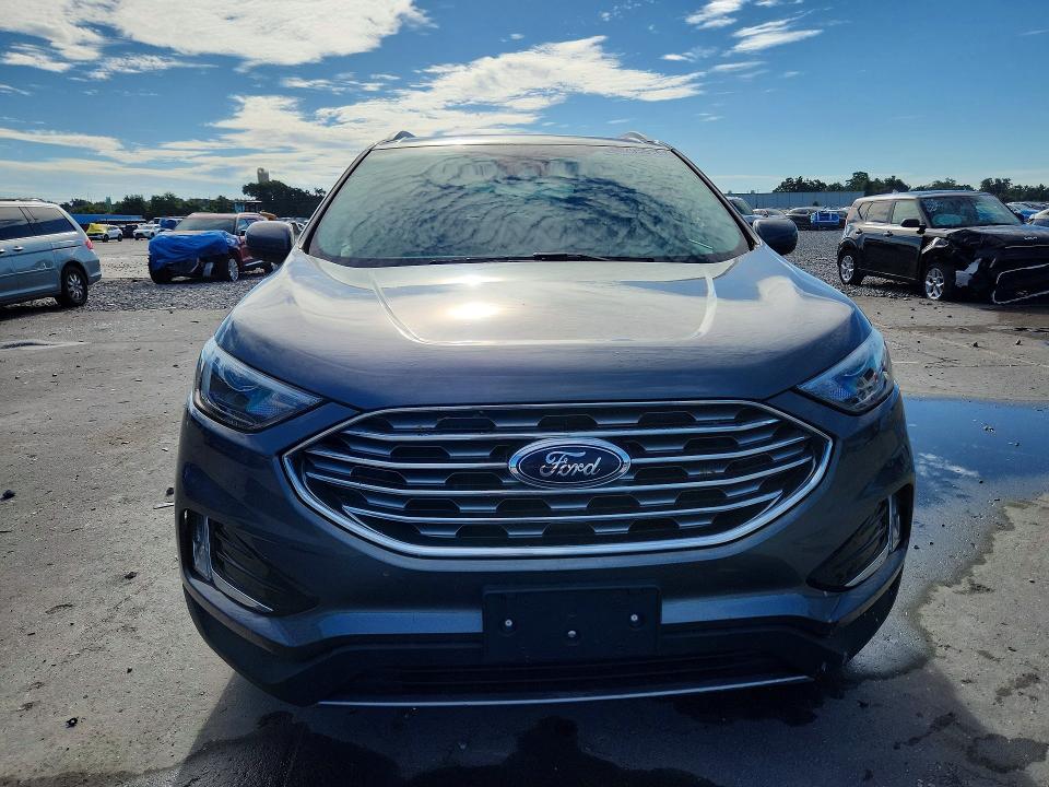 Foto 5 de la subasta – 2022 FORD EDGE con VIN 2FMPK4J98NBA64768